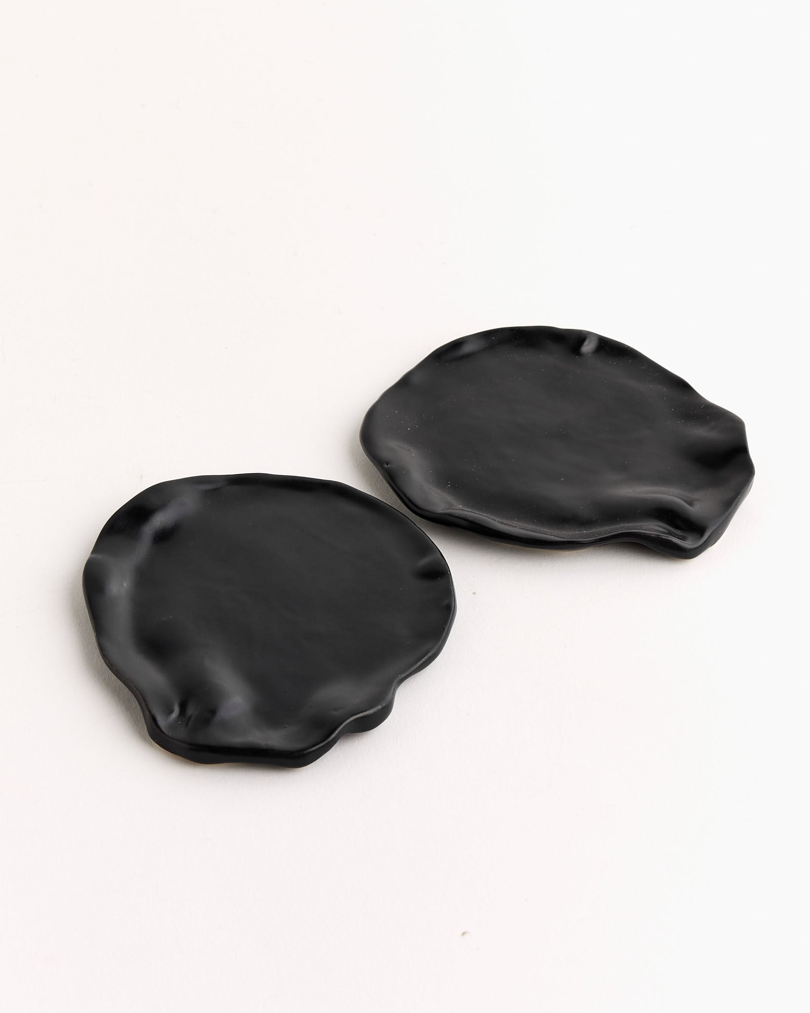 The Mostly Flat Set of 2 Coasters in Matte Black